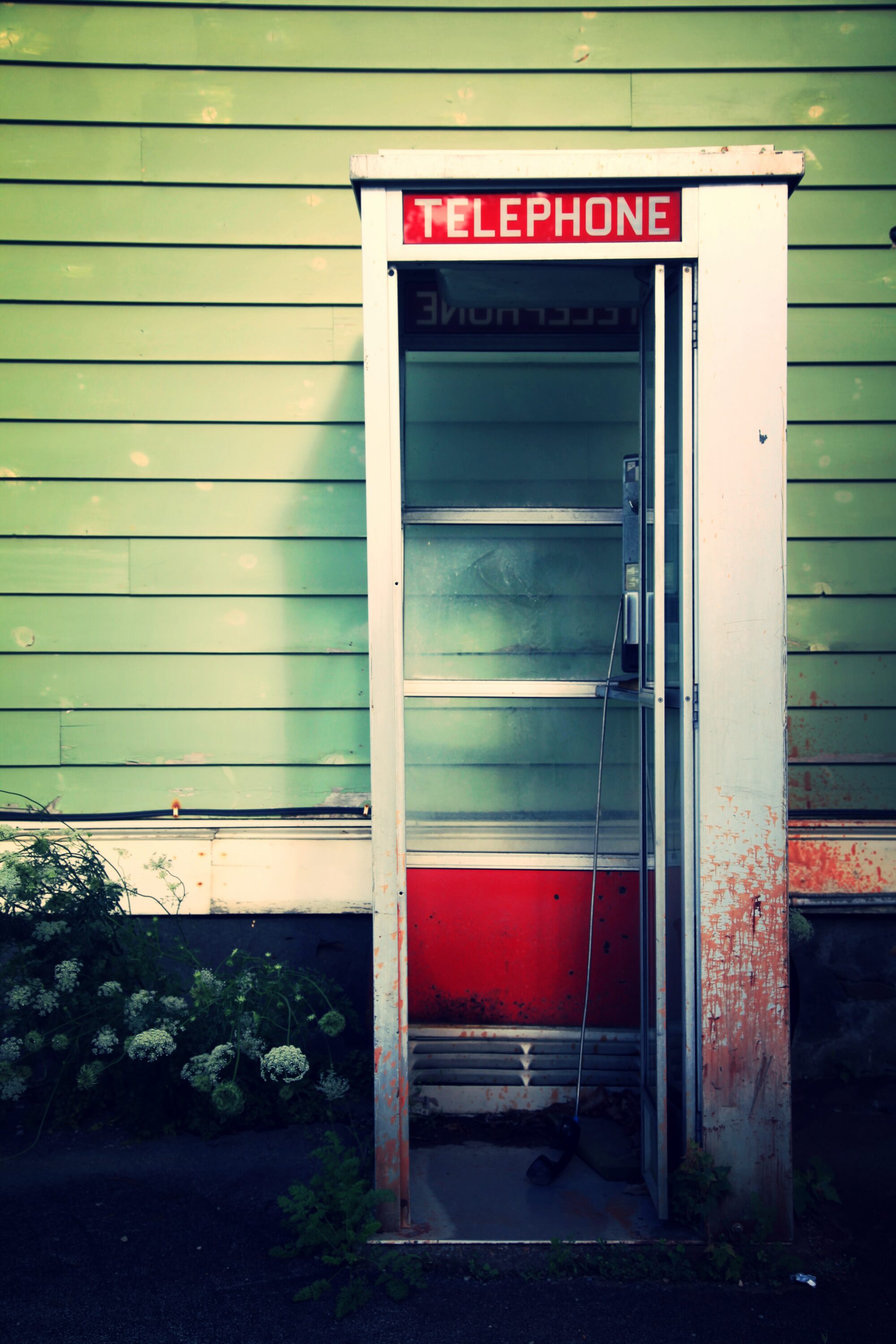 Standing Outside A Broken Phone Booth Broken Hearted